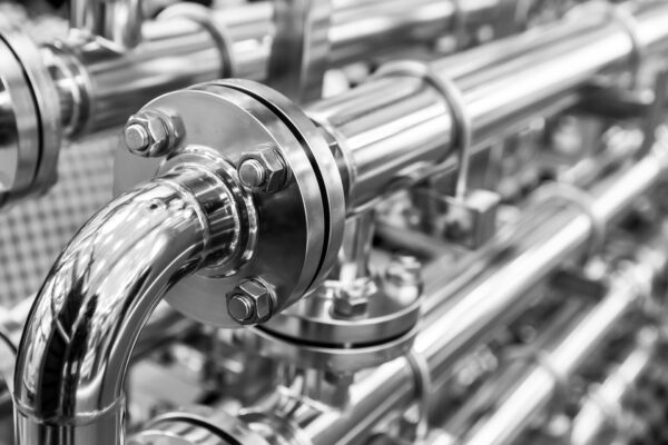 steel-water-pipeline-chrome-pipes-closeup-reliable-plumbing-engineering-technology-min